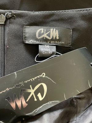 Дамска пола с джобчета и цип CKM L