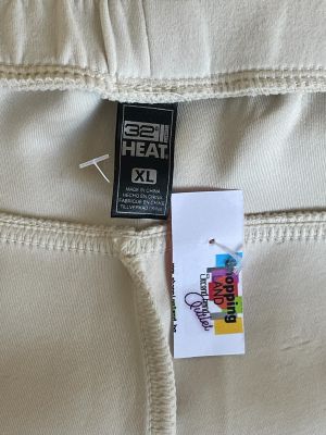 Дамско спортно долнище с джобове и връзки 32 DEGREES HEAT XL